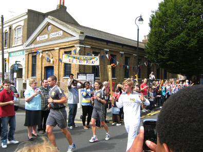 photo of torch going east along saddington street